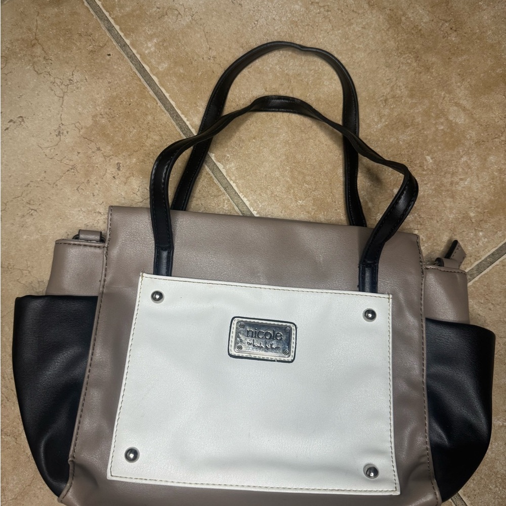Nicole Miller Black and White Shoulder Bag with Structured Design